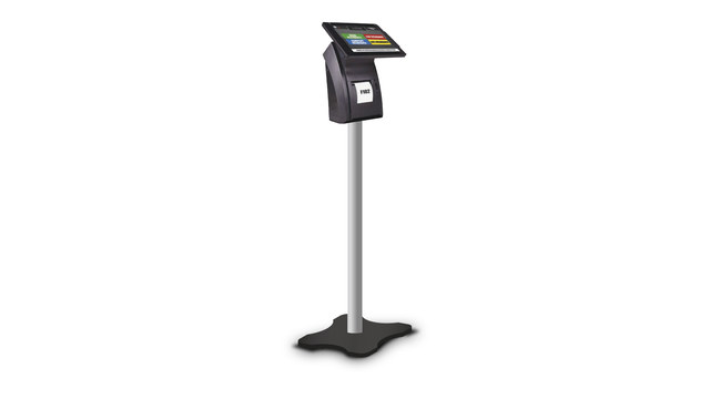 Expendedor táctil del sistema de turnos Microtouch montado sobre su pedestal de piso, de cuerpo completo.